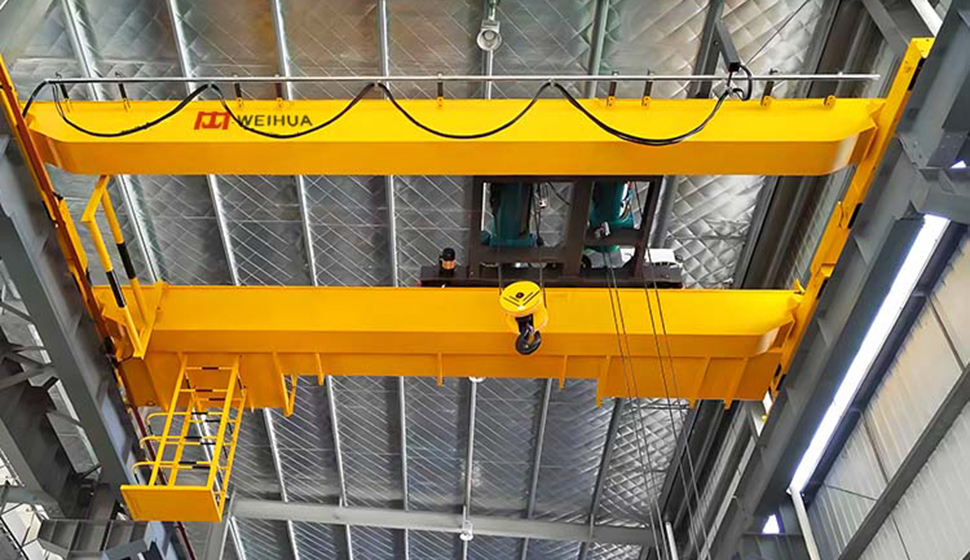 Puente grúa birraíl con polipasto eléctrico
